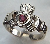 Medium claddagh ring with .25ct heart shaped ruby