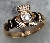 Small claddagh ring with .10ct bezel set round diamond