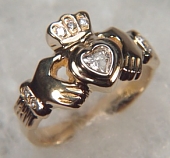 14KY medium claddagh ring with .25ct heart shaped diamond and diamond accents in the cuffs