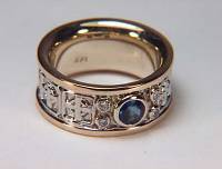 14KT two tone custom celtic cross bands with diamonds & sapphire