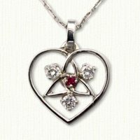 Tri-color gold free form diamond pendant with .62ct diamond