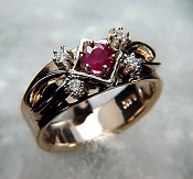 Hand made two tone ruby and diamond ring