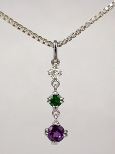 14KW amethyst, emerald, and diamond pendent