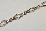 #BR2054 14kt two tone tennis bracelet .20ct tw