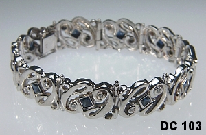 14KW custom C initial bracelet with sapphires and diamonds