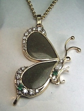 Opal butterfly pendant with diamonds and emeralds