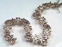 Fleur-de-lis Bracelet in 2 tone gold with diamonds