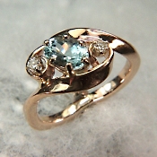 Aquamarine ring with 2 diamonds