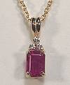 1.23ct Emerald cut ruby pendant with .06ct of diamonds
