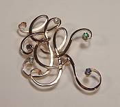 14kt yellow gold E T K monogram pin with gemstones