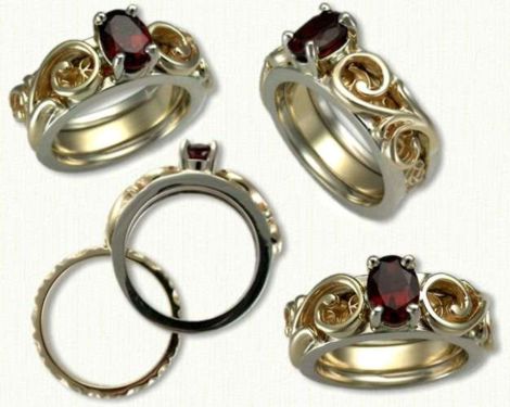 Floral scroll reverse cradle in 14kt white and yellow gold set with an oval garnet